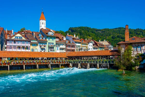 stock image Thun, Switzerland, September 22, 2022: Untere Schleuse covered bridge in Swiss town Thun.