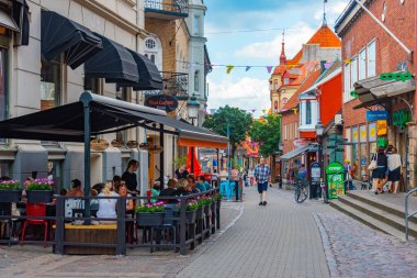 Ystad, Sweden, July 13, 2022: Commercial street in Ystad, Sweden..IMAGE clipart