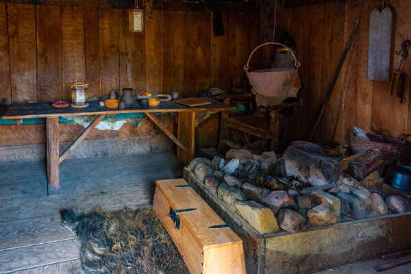 Foteviken, Sweden, July 13, 2022: Interior of wooden huts at Foteviken viking museum in Sweden.IMAGE