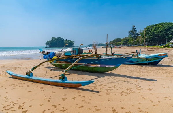 stock image Weligama, Sri Lanka, January 22, 2022: Fishing boats at Weligama beach, Sri Lanka.