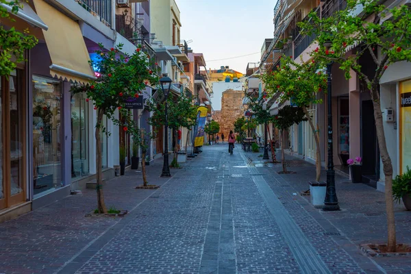 stock image Chania, Greece, August 23, 2022: Sunrise view of a tourist street in Greek town Chania at Crete island.