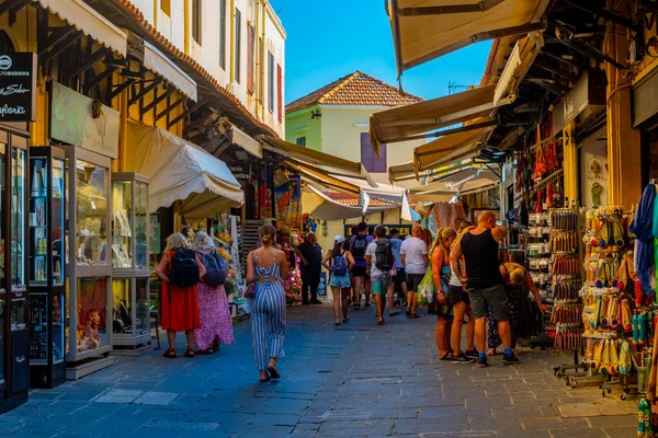 stock image Rhodes, Greece, August 27, 2022: Sunset view of a tourist street in Greek town Rhodes.