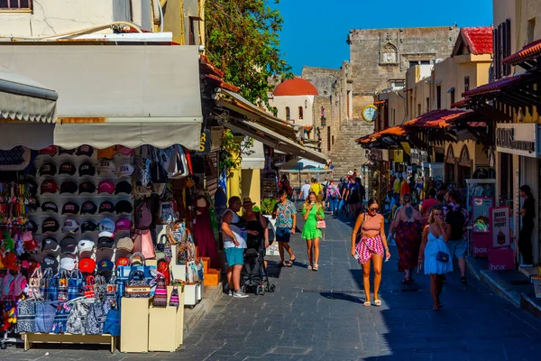 stock image Rhodes, Greece, August 27, 2022: Sunset view of a tourist street in Greek town Rhodes.