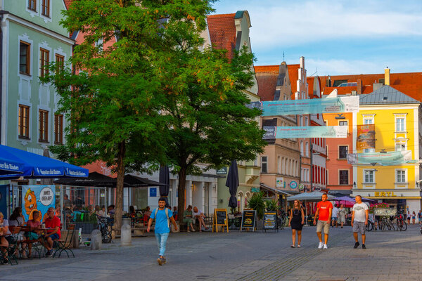 Ingolstadt, Germany, August 13, 2022: Sunset view of a commercial street in German town Ingolstadt.