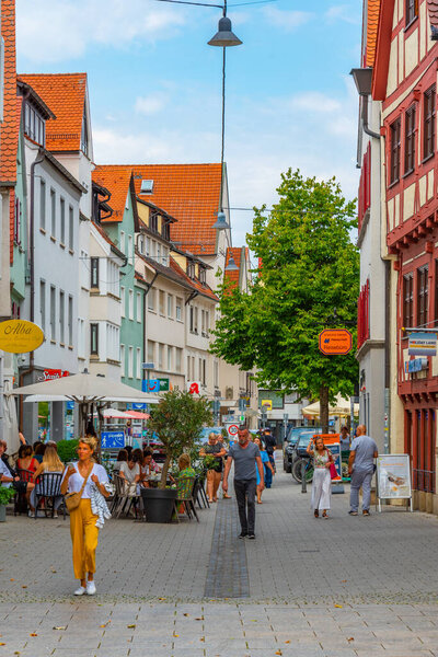 Ulm, Germany, August 16, 2022: People strolling in the old town of German town Ulm.