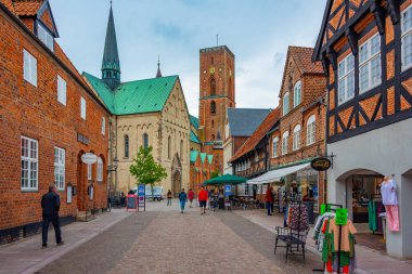 Ribe, Denmark, June 17, 2022: Street leading to Ribe cathedral in Denmark. clipart