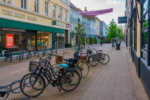 stock image Odense, Denmark, June 19, 2022: Sunset view of a street in the center of Odense, Denmark.