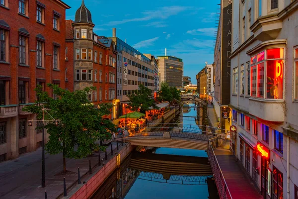 stock image Aarhus, Denmark, June 15, 2022: Nightlife alongside central channel in Aarhus, Denmark.