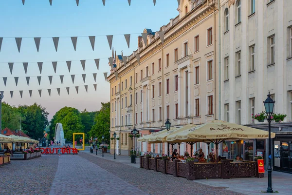 stock image Tartu, Estonia, June 27, 2022: Sunset view of Restaurants at the town hall square in Estonian town Tartu.