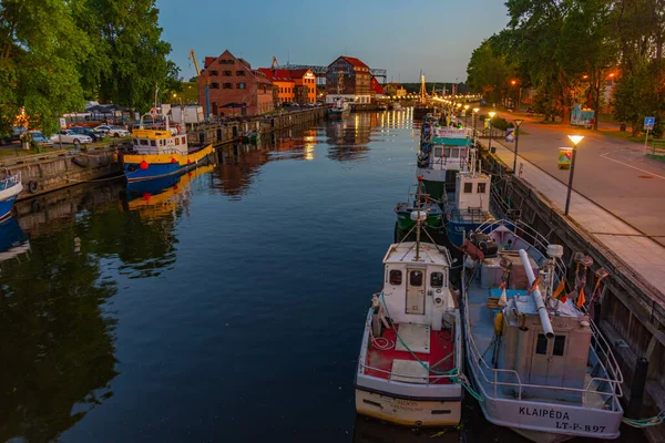 Stock image Klaipeda, Lithuania, July 3, 2022: Boats mooring at riverside of Danes river in Klaipeda, Lithuania.