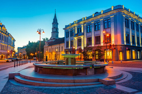 Vilnius, Lithuania, July 7, 2022: Night view of Rotuses aikste - the town hall square of the lithuanian capital Vilnius, Lithuania .