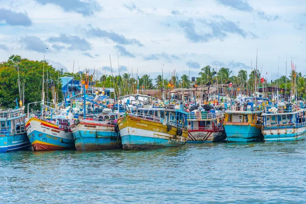 stock image Negombo, Sri Lanka, February 13, 2022: Fishing boats mooring at the shore of Negombo lagoon in Sri Lanka.