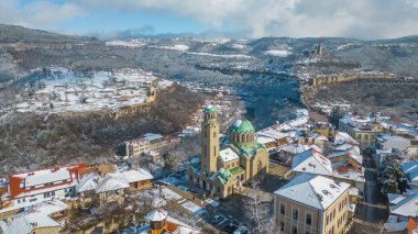 Winter aerial view of Tsarevets and Trapezitsa fortresses in Veliko Tarnovo, Bulgaria clipart