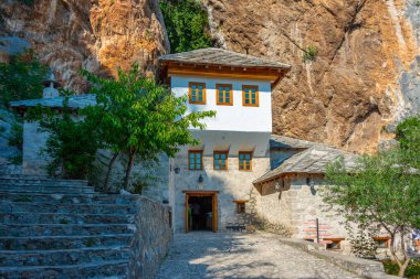 Blagaj Tekke - Historic Sufi monastery built on the cliffs by the water in Bosnia and Herzegovina clipart