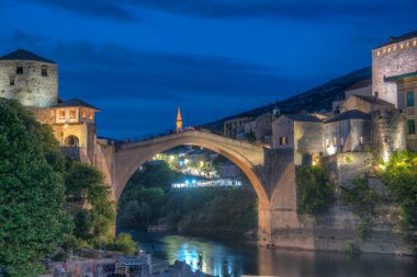 Sunset view of the old Mostar bridge in Bosnia and Herzegovina clipart