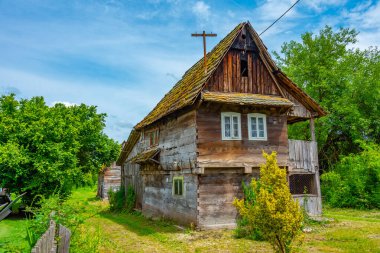 Traditional wooden houses in Croatian village Cigoc clipart