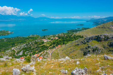 Panorama of islands on Skadar lake in Montenegro clipart