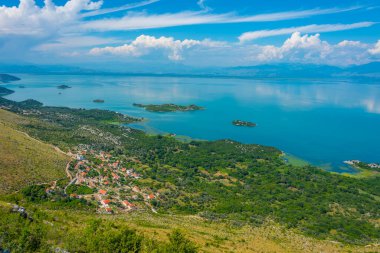 Panorama of islands on Skadar lake in Montenegro clipart