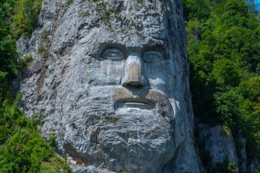 Rock Sculpture of Decebalus at Iron Gates national park in Romania clipart