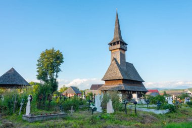 Cuvioasa Paraschiva wooden church church in Sat-Sugatag, Romania  clipart