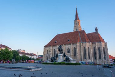 Sunset view of Saint Michael church in Cluj-Napoca, Romania clipart
