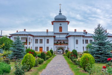 Varatec monastery during a cloudy day in Romania clipart