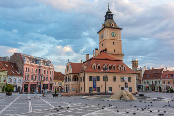 Sunrise view of town hall at the The Council's Square in Brasov, Romania