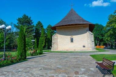 Bogdana monastery during a sunny day in Romania clipart