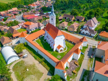 Fortified church in Romanian village Darjiu clipart