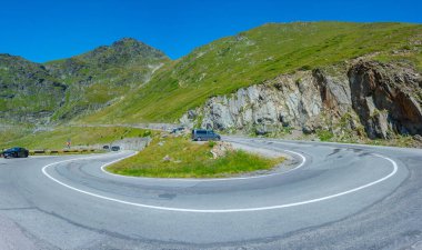 Transfagarasan road viewed during a sunny day in summer, Romania clipart