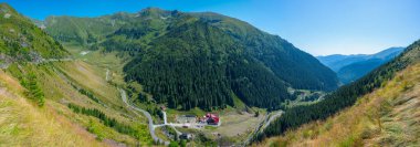 Transfagarasan road viewed during a sunny day in summer, Romania clipart