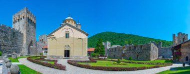 Manasija monastery in Serbia during a sunny day clipart