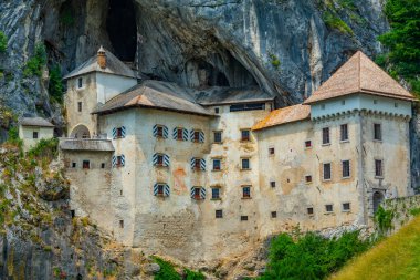 View of Predjama castle in Slovenia clipart