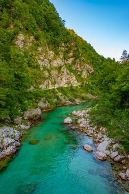 Sunset view over Soca river in Slovenia clipart