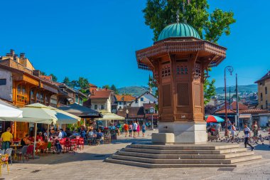 Sarajevo, Bosnia and Herzegovina, July 16, 2023: Sebilj fountain at Bascarsija square during a sunny day in Sarajevo, Bosnia and Herzegovina clipart