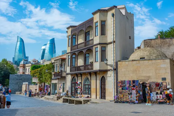 stock image Baku, Azerbaijan, September 17, 2023: Mix of historical and contemporary architecture in the old town of Baku, Azerbaijan