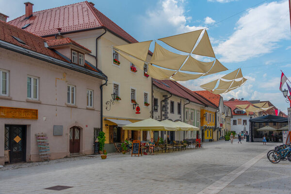 Radovljica, Slovenia, June 19, 2023: People are strolling Linhartov trg square in Radovljica, Slovenia