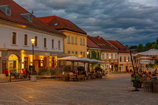 Novo Mesto, Slovenia, 24 June 2023: Sunset view of the Glavni trg square in Slovenian town Novo Mesto