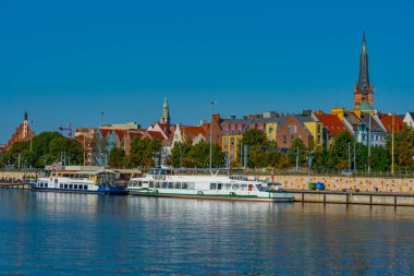 Szczecin, Poland.IMAGE 'deki West Oder nehrinin gün doğumu manzarası