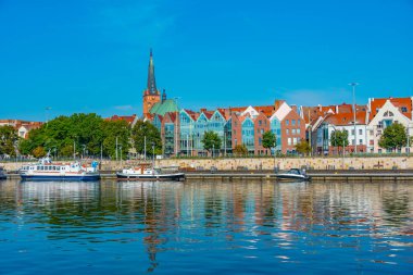 Szczecin, Poland.IMAGE 'deki West Oder nehrinin gün doğumu manzarası
