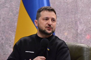 Ukrainian President Volodymyr Zelenskyy speaks to the media during a press conference as Ukraine marks one year since Russia's large-scale invasion, on February 24, 2023 in Kyiv, Ukraine.  clipart