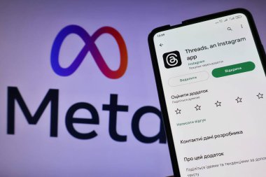 Bu fotoğraf illüstrasyonunda, akıllı bir telefonda görülen iplik logosu. Meta, Twitter 'a rakip olacak 