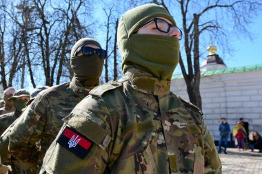 Recruits in military uniform during action 'Don't Be Silent. Captivity Kills' on April 07, 2024 in Kyiv, Ukraine.  clipart