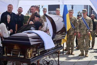 KYIV, UKRAINE - 20240709: The squad and the family cry at the hour of farewell to the soldier of the 72nd brigade named after the Black Cossacks Volodymyr Sergievsky on the pseudo 