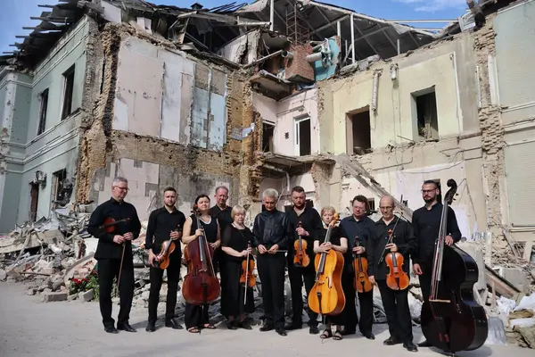 stock image Musicians pose for a photo at a concert titled 'Requiem for the Dead,' dedicated to honoring the memory of those killed in an airstrike on the country's largest children's hospital, Okhmatdyt in Kyiv, Ukraine on July 12, 2024.