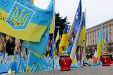 Flags flutter on Independence Square at the improvised memorial to the fallen Ukrainian soldiers on October 1, 2024 in Kyiv, Ukraine. clipart