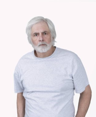 Vertical shot of a beaded old man with white hair on a white background.  Standing from the waist up.