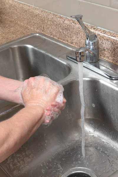 Vertical Shot Woman Washing Her Hands Kitchen Sink Running Water — Stockfoto