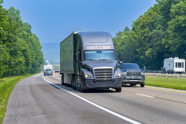 Horizontal shot of Tennessee interstate traffic on a summer morning.
