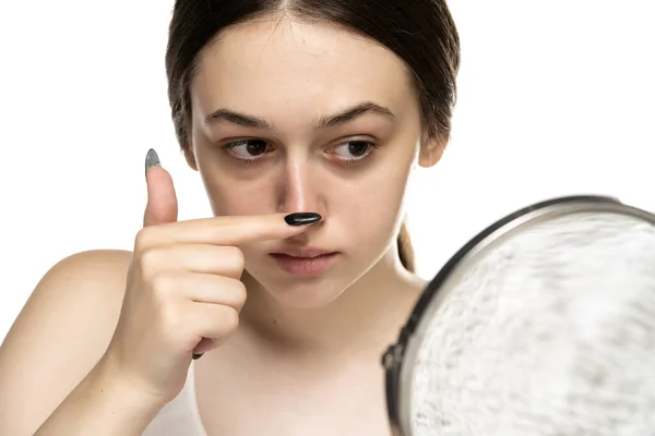 Young Unhappy Woman Touches Her Nose Her Fingers White Background — 图库照片